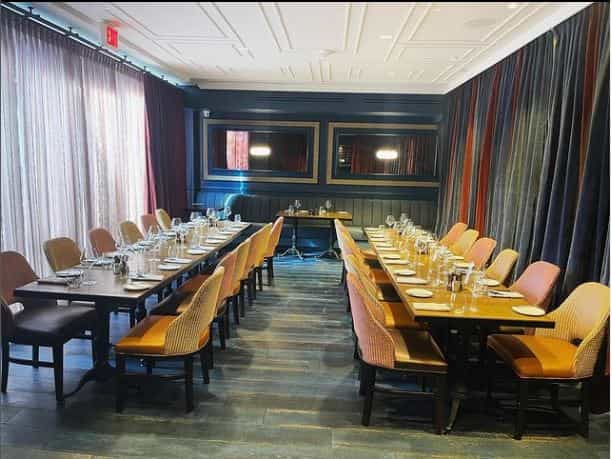Elegant meeting space at Brasserie Liberté for corporate events and gatherings.