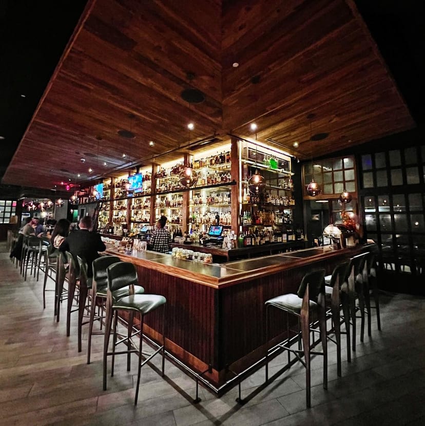 Stylish bar at Crimson View, ideal for networking events and gatherings.