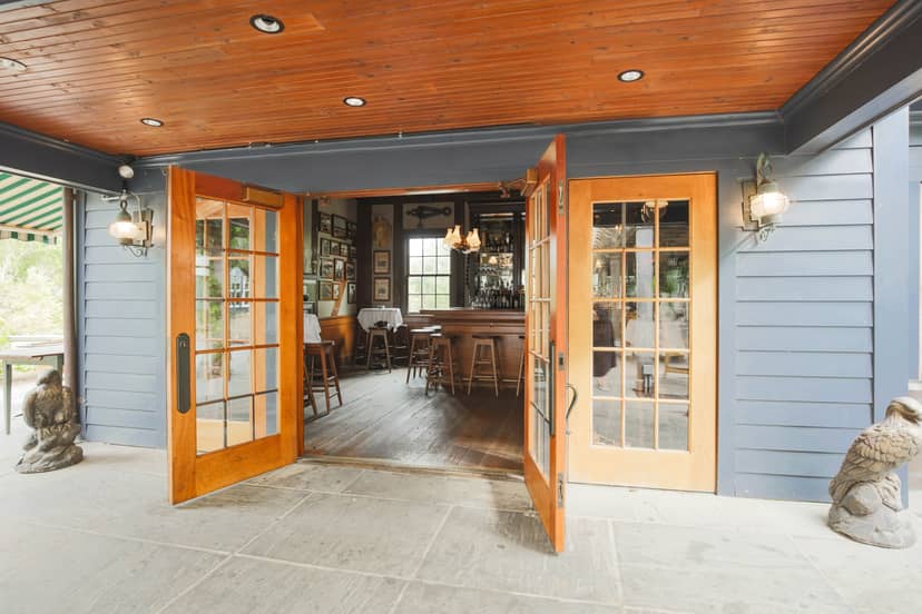 Piedmont Room entrance at Clyde's, rustic venue for meetings and events.