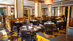Semi-private dining area in Daily Grill DC, ideal for intimate meetings and events.