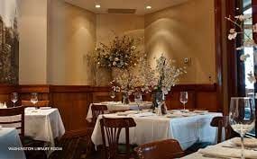 Elegant semi-private dining space in Daily Grill DC for upscale events and meetings.