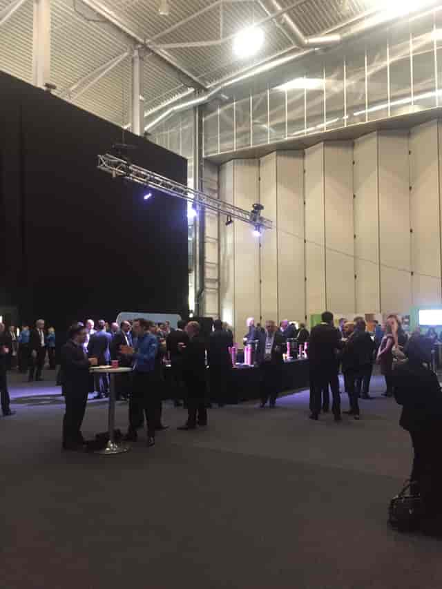 Networking event at Conservation Hall, IWM Duxford, featuring a spacious layout and refreshments.