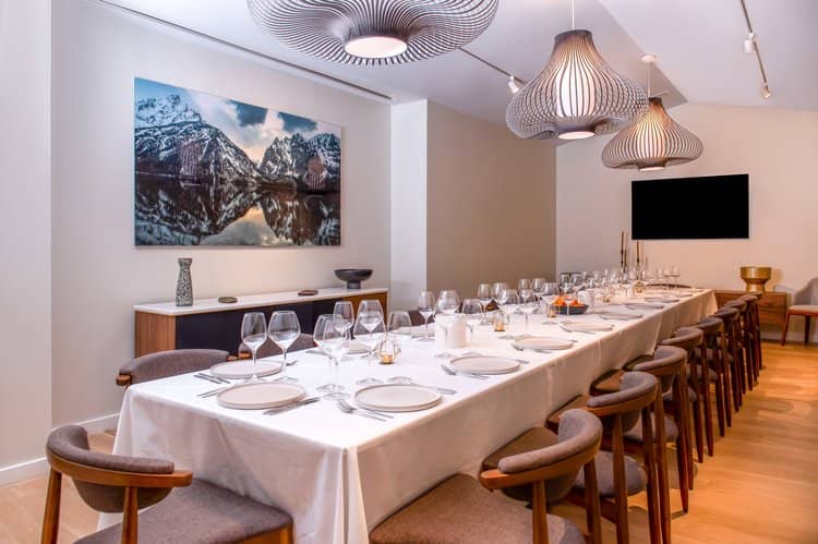 Elegant dining setup for corporate dinners at The Henri Restaurant in winter.
