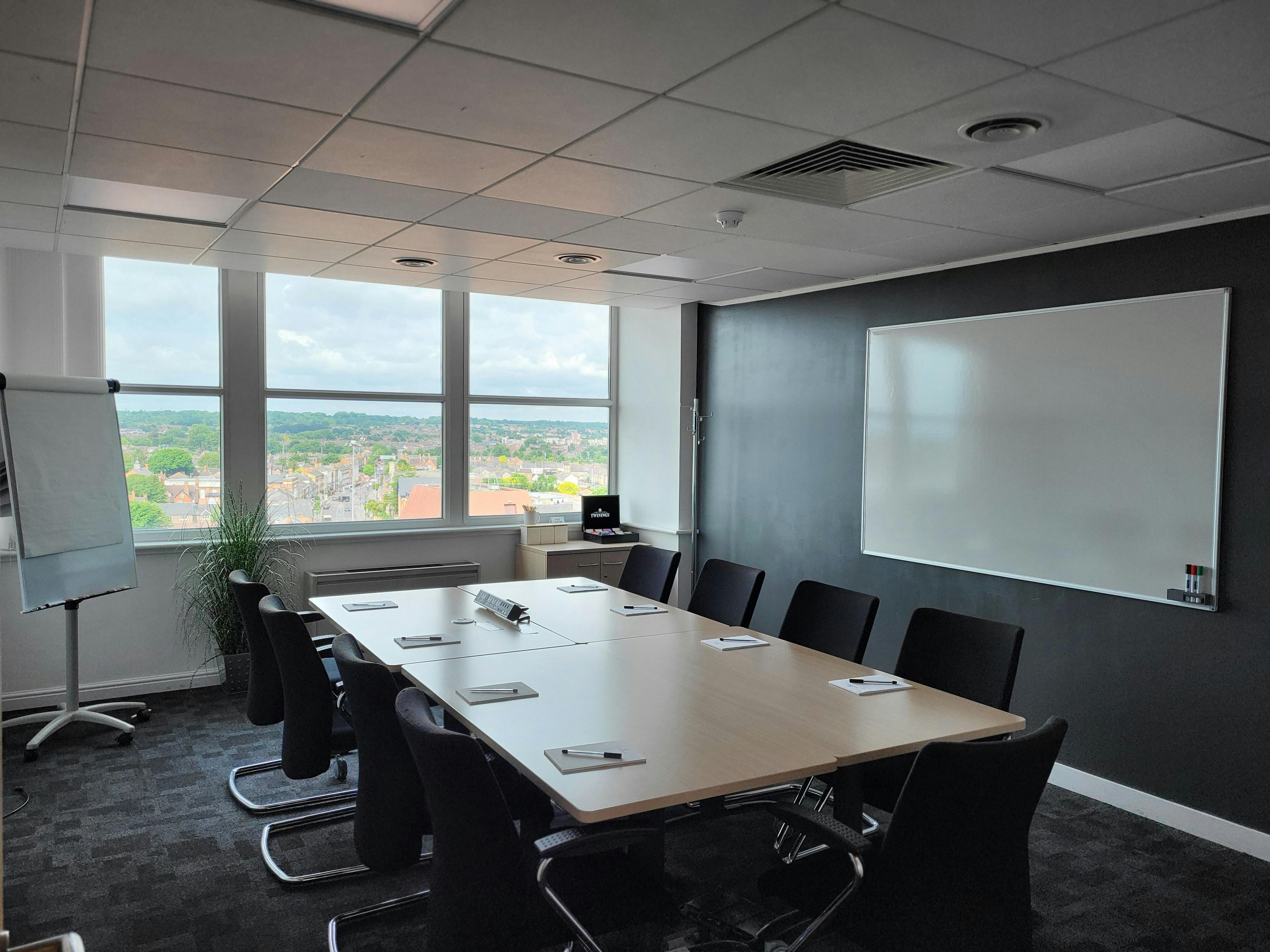 Modern meeting room with large windows for collaboration at Reading Business Centre.