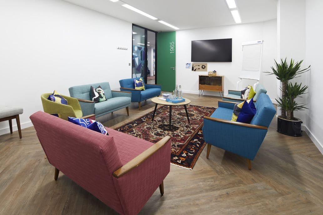 Modern meeting space in Wallacespace Covent Garden, featuring colorful seating for workshops.