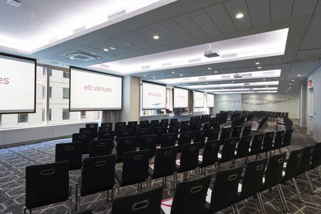 Modern conference room at etc.venues 360 Madison Avenue, ideal for events and presentations.