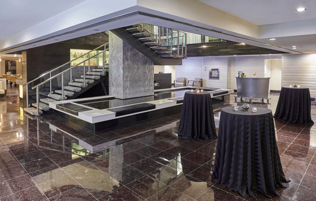 Modern event space in Hyatt Regency Toronto with polished marble floors for receptions.