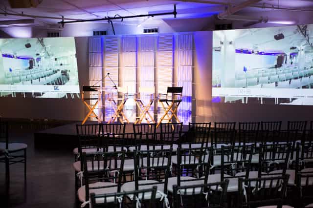 Tribeca 360 event space with sleek stage setup and ambient lighting in New York.