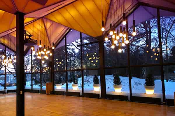 La Toundra event space in Montreal with large windows and snowy landscape backdrop.