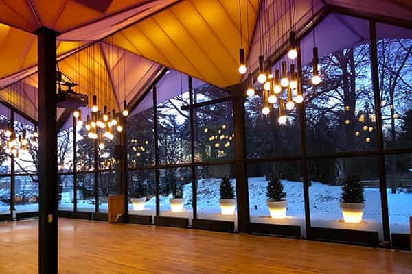 La Toundra event space in Montreal with large windows and snowy landscape backdrop.