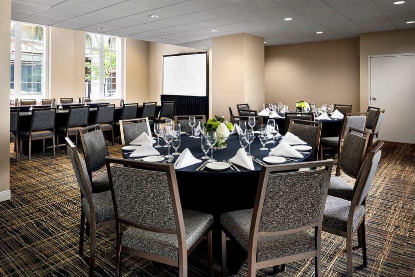 Elegant meeting space in Westin Montreal with round tables, ideal for corporate events.