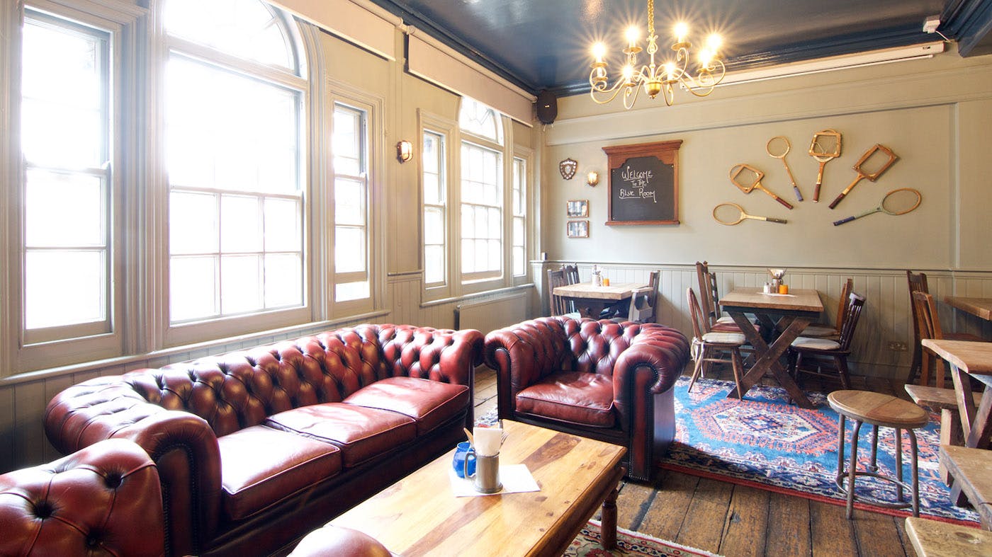 Cozy Blue Room at St Aldates Tavern, perfect for meetings and networking events.