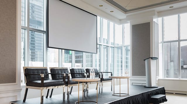 Inverness Room at Vantage Venues, modern event space for panel discussions and presentations.