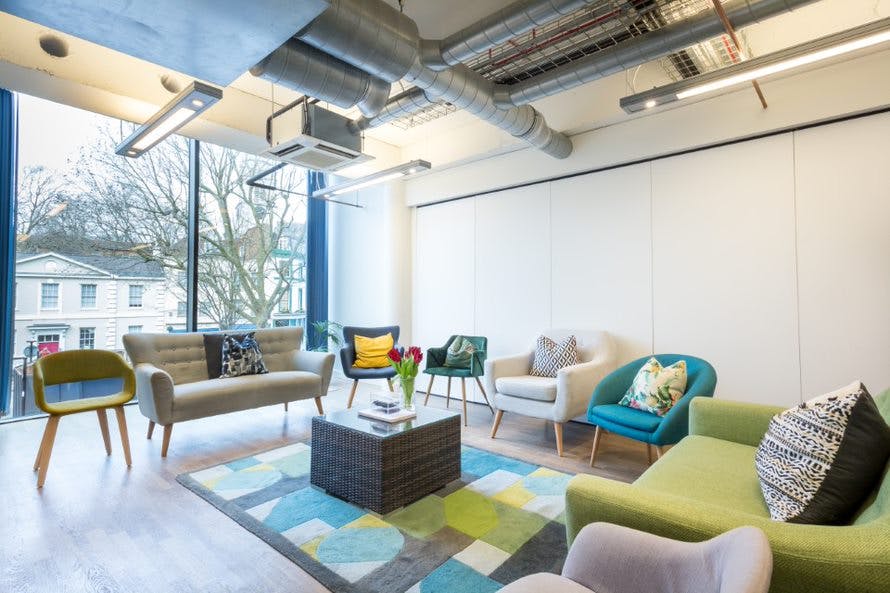 Modern meeting space at Wallacespace Clerkenwell Green with colorful seating for collaboration.