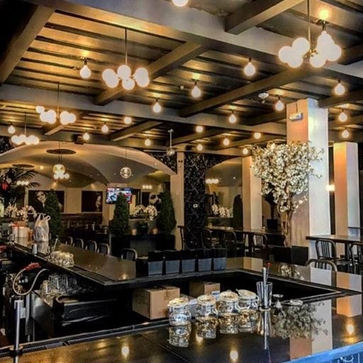 Stylish event space at Proper 21 with modern decor, ideal for cocktail receptions.