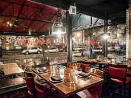 Main Dining Room at Agora DC, modern decor, ideal for corporate events and gatherings.