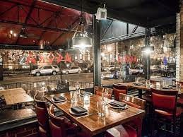 Main Dining Room at Agora DC, modern decor, ideal for corporate events and gatherings.