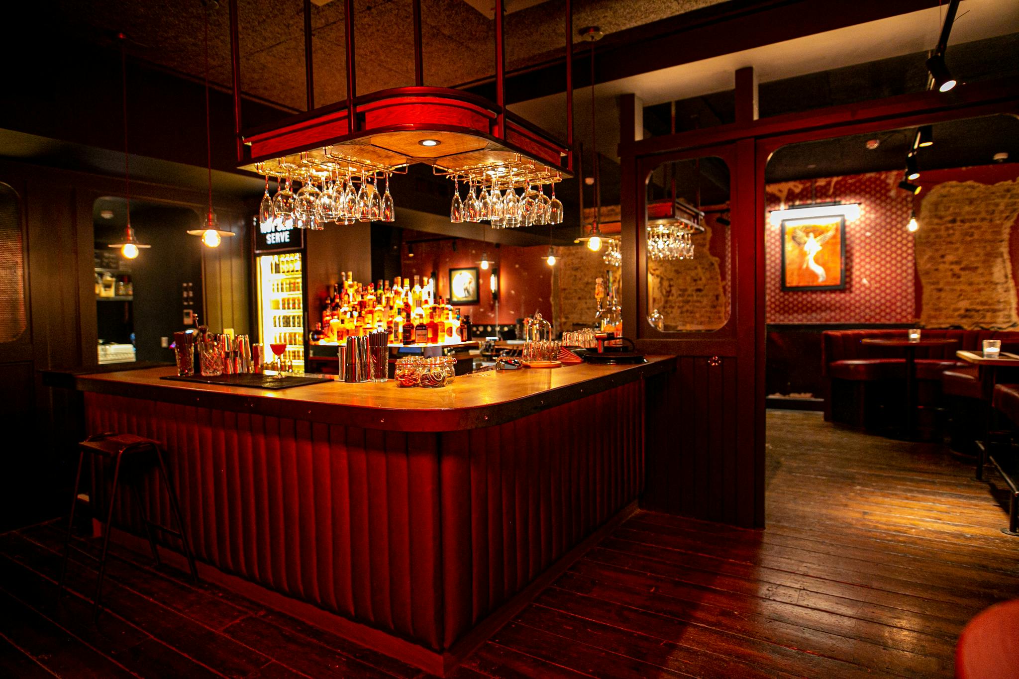 Stylish bar at Upstairs at The Black Horse, ideal for networking events and gatherings.