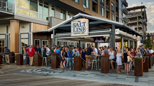 Outdoor bar and patio at The Salt Line, perfect for social events and gatherings.