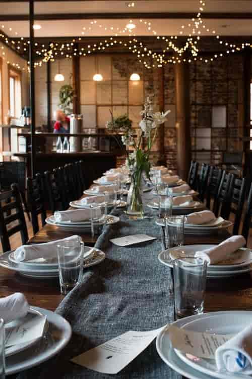 Elegant long dining table at Big Bear Cafe, perfect for intimate gatherings or corporate dinners.