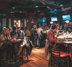 Main Dining Room at Blackfinn Ameripub DC, vibrant setting for networking events.