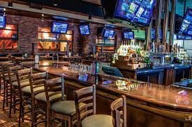 Main Dining Room at Blackfinn Ameripub DC, vibrant bar for networking events and gatherings.