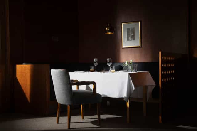 Private dining room in Savoy Helsinki, elegant setup for exclusive events and meetings.
