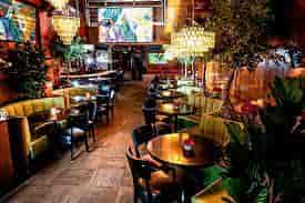 Full Buyout at The Park at 14th: vibrant venue with lush greenery for events and meetings.