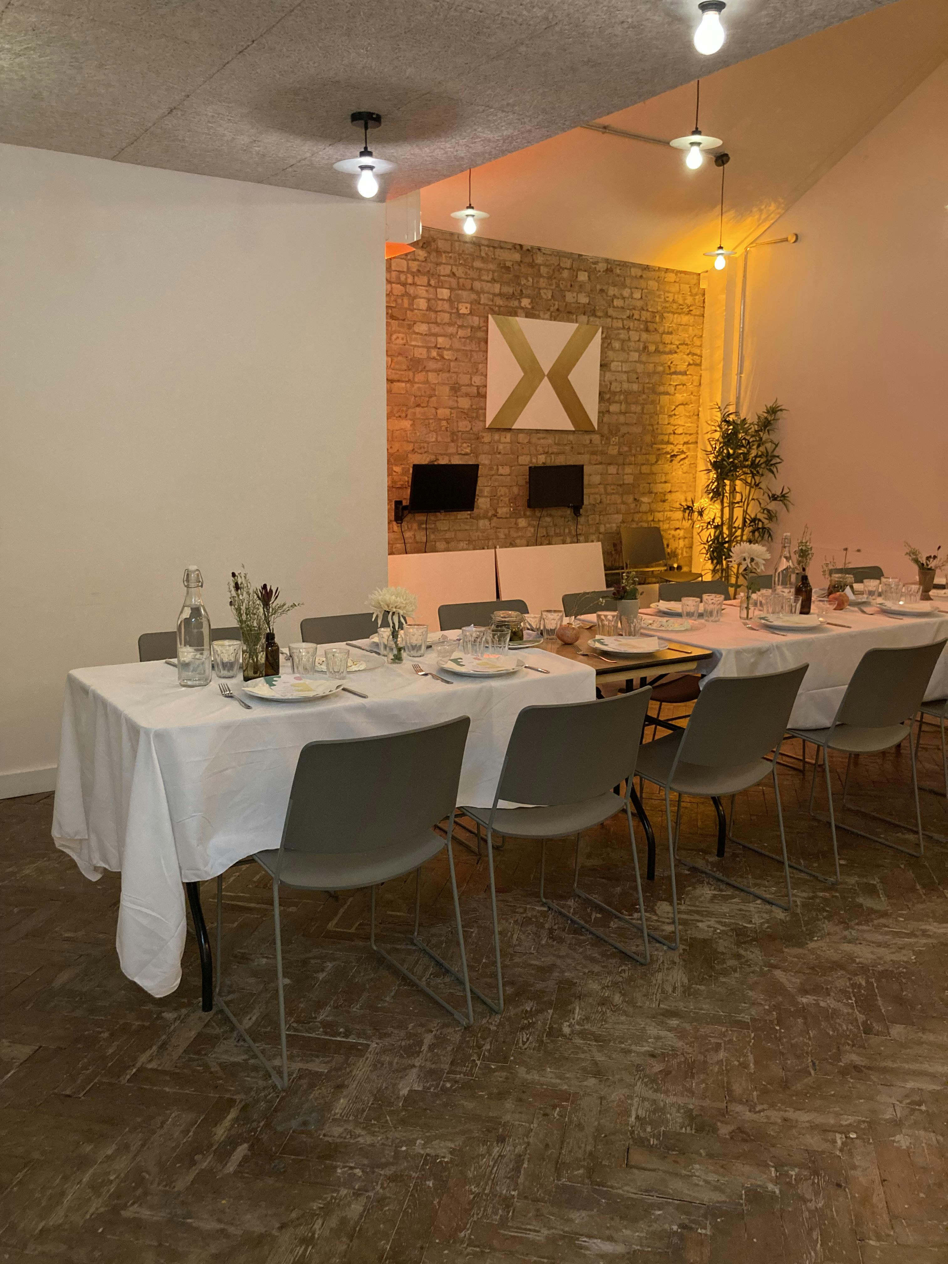 Private dining setup in King's House with elegant decor for meetings and events.