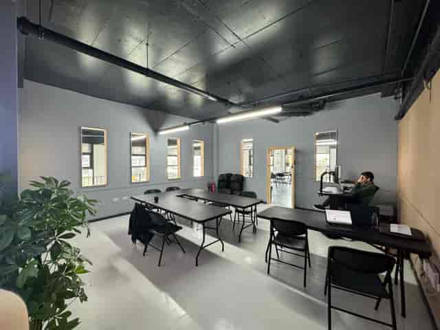 Versatile meeting space at Royal Albert Wharf, ideal for workshops and team meetings.