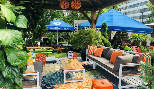 Vibrant outdoor event space with colorful decor for networking and social gatherings.
