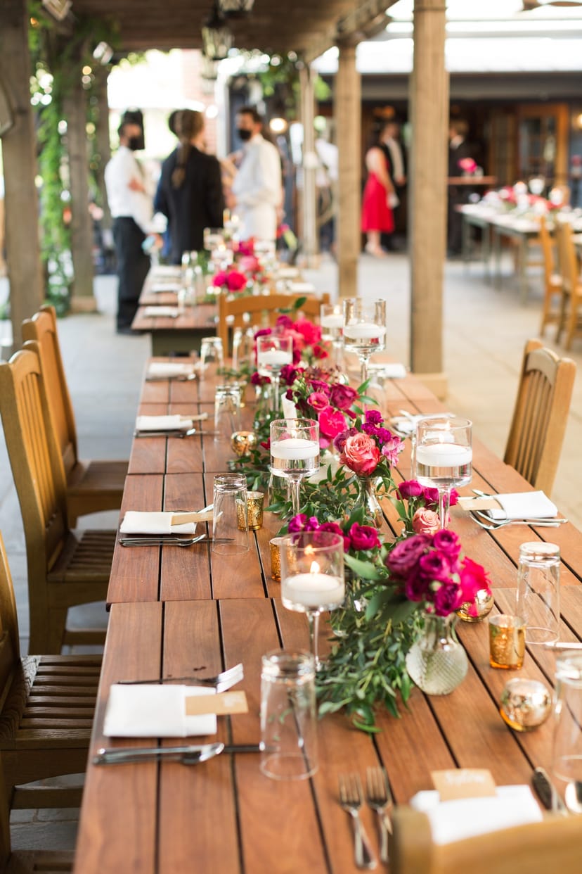Elegant long table with floral centerpieces for weddings at Clyde's of Georgetown.