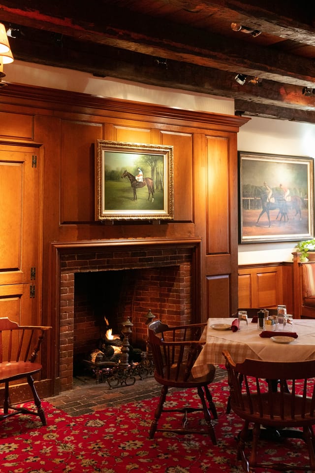 Cozy dining space with wooden paneling at Clyde's of Georgetown for upscale events.