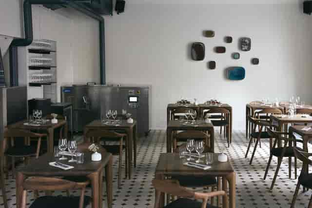 Modern dining space in Nolla for intimate gatherings and corporate events.