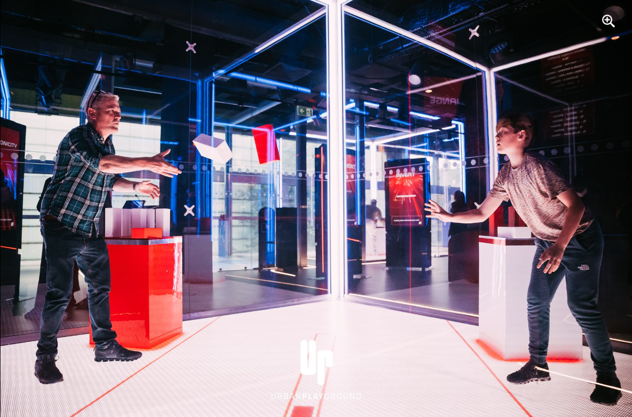 The CUBE Live Experience: interactive setup for modern events, vibrant lighting, networking.