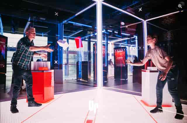 The CUBE Live Experience: interactive setup for modern events, vibrant lighting, networking.