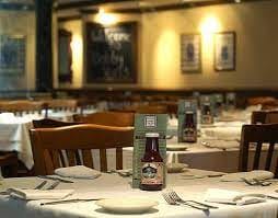 Atrium/Private Bar at Bobby Van's Grill, cozy dining area for intimate gatherings and meetings.