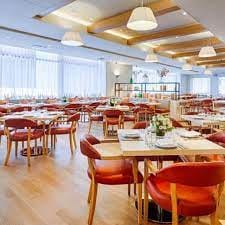 Modern restaurant interior at Fig & Olive DC, ideal for events and gatherings.