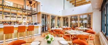 Modern restaurant interior at Fig & Olive DC, perfect for corporate events and celebrations.