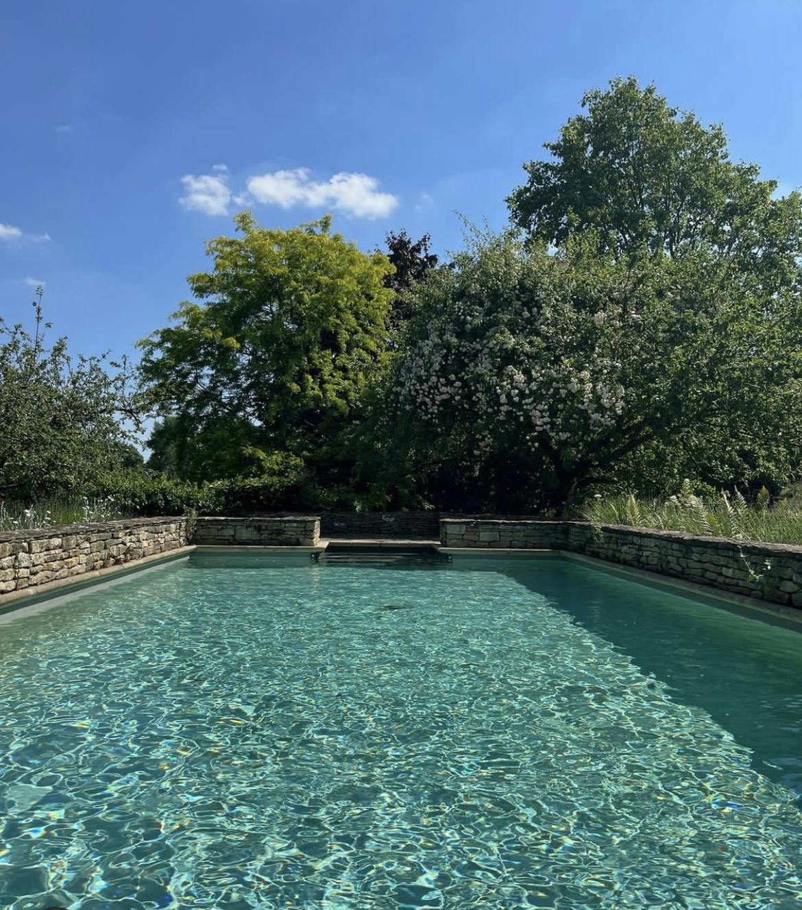 Serene outdoor swimming pool at Church Farm Estate, perfect for events and relaxation.