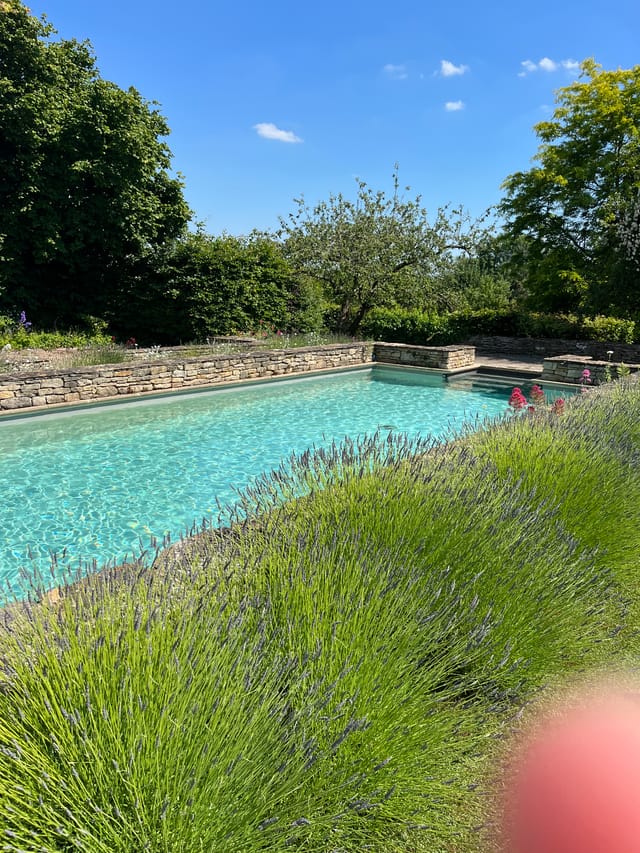 "Serene Church Farm Estate swimming pool for outdoor events and team-building activities."