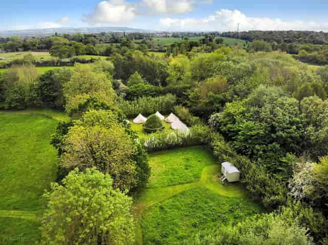 Serene glamping venue in Church Farm Estate, perfect for retreats and team-building events.