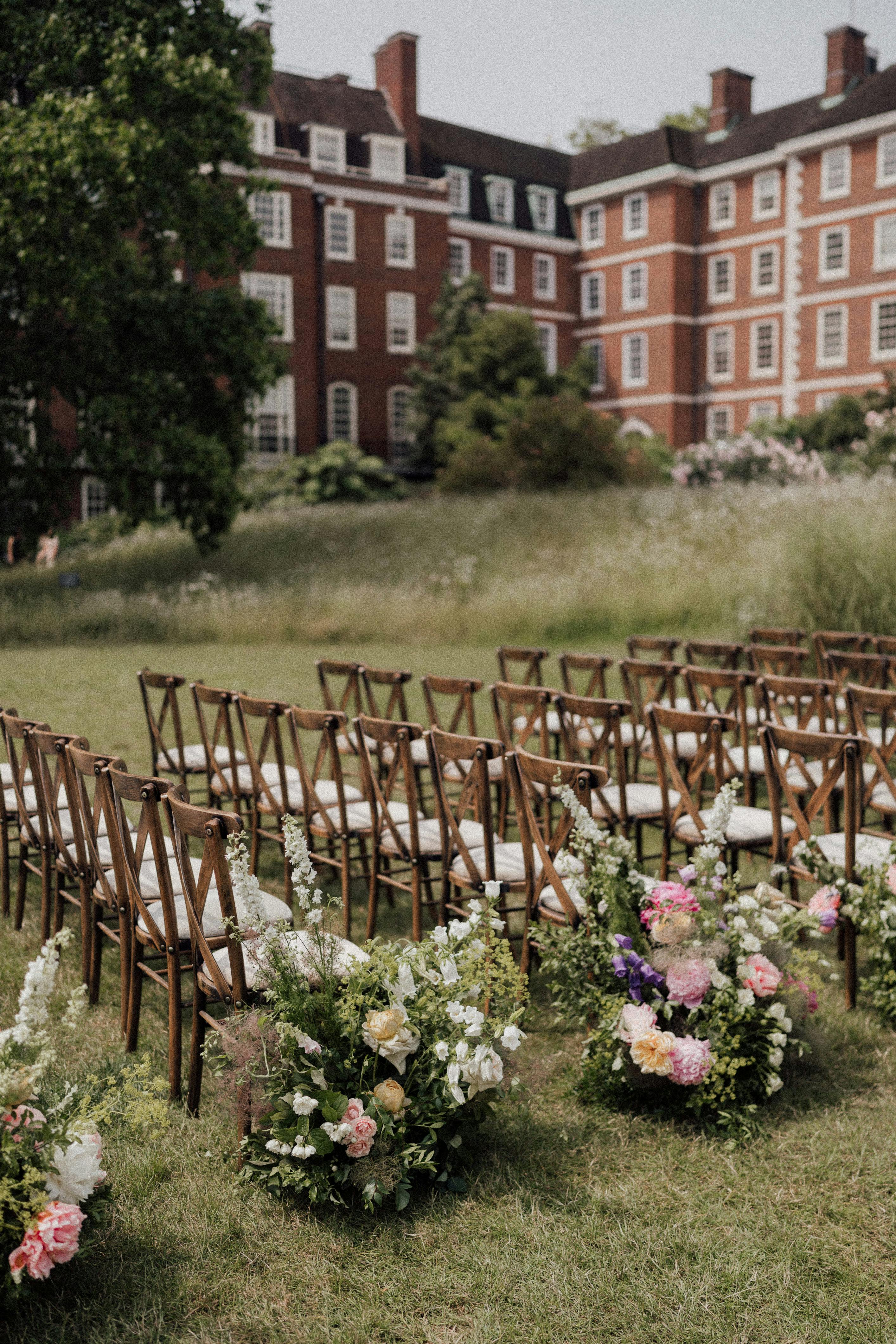 Elegant wooden chairs in The Inner Temple garden, perfect for outdoor weddings.