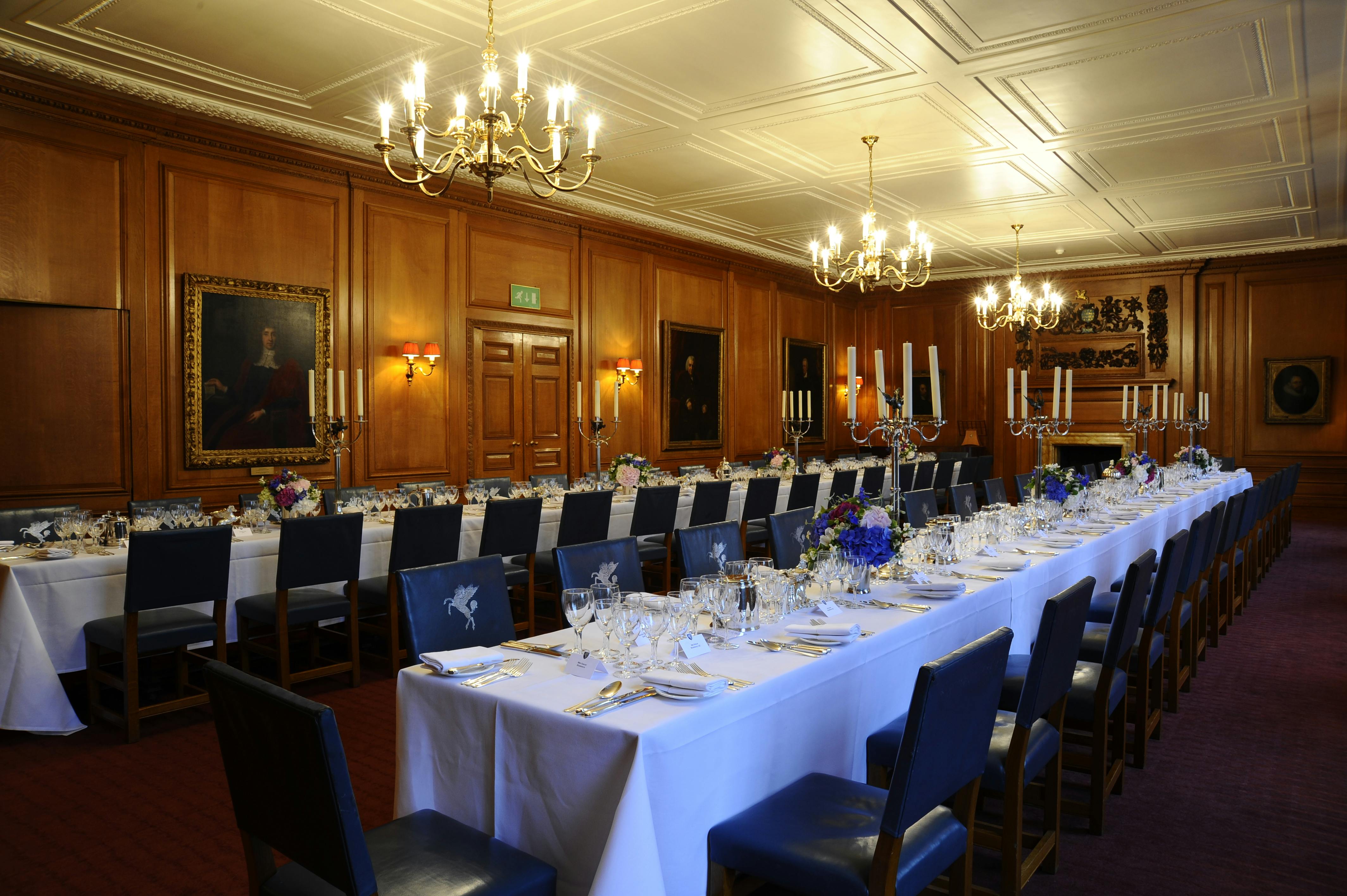 Elegant dining room in Parliament Chamber, ideal for formal events and corporate dinners.