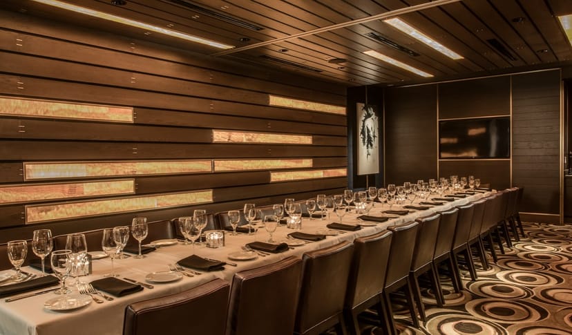 Elegant dining setup in The Arlington Room, perfect for corporate meetings and private events.