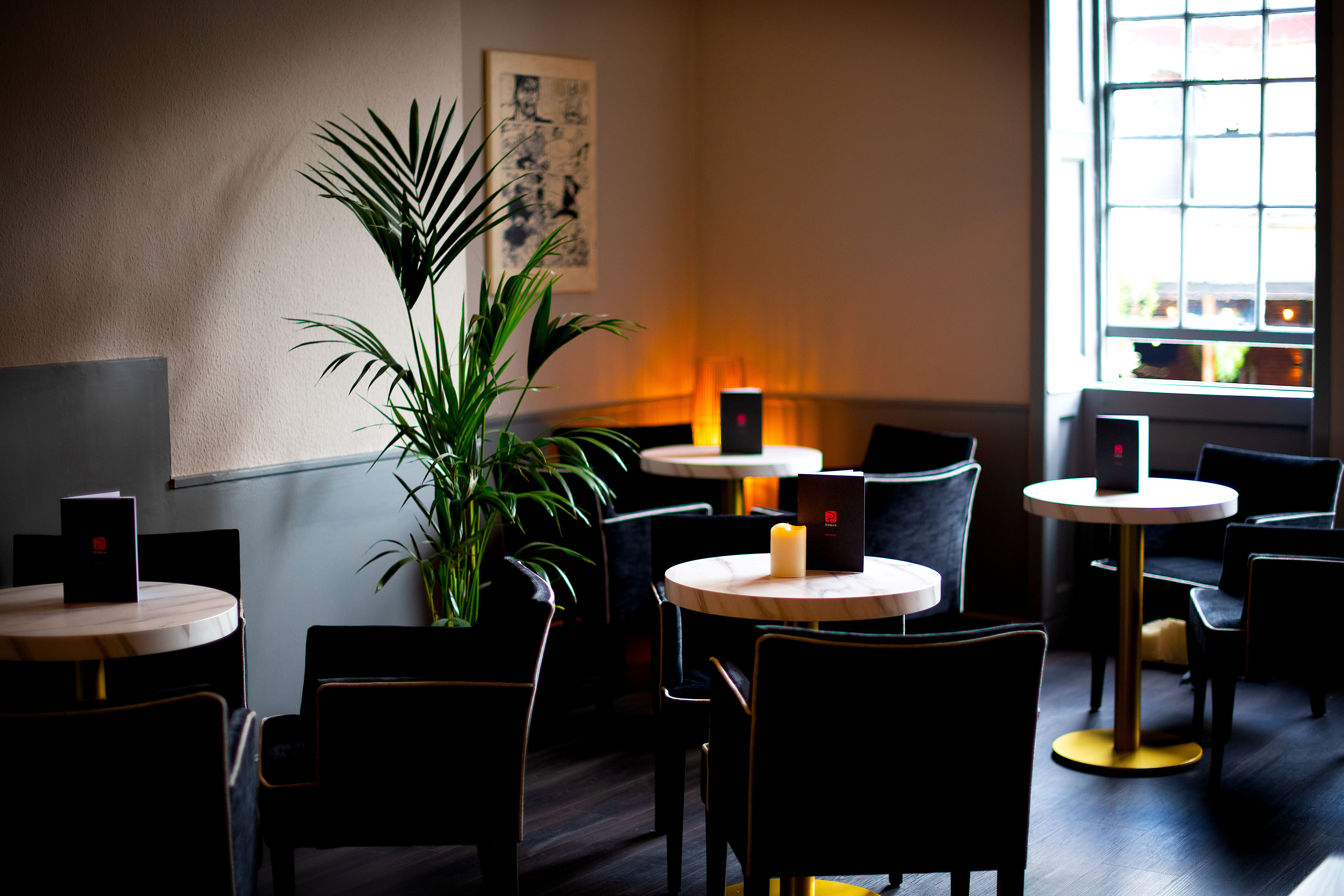 Intimate Kanagaki Suite meeting space with warm lighting, ideal for networking events. - Banner