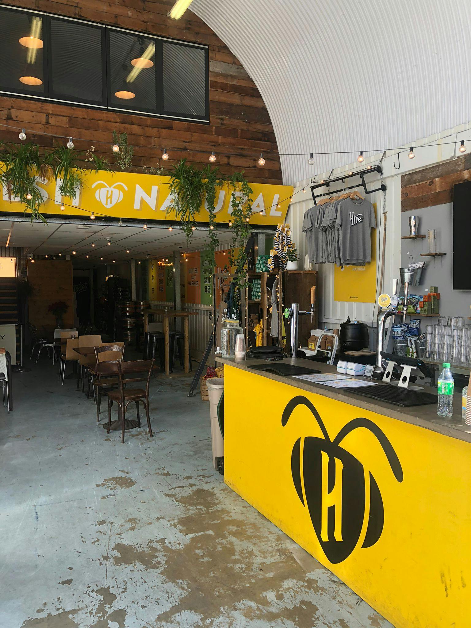 Hiver beer in a vibrant taproom, perfect for networking events and casual gatherings.