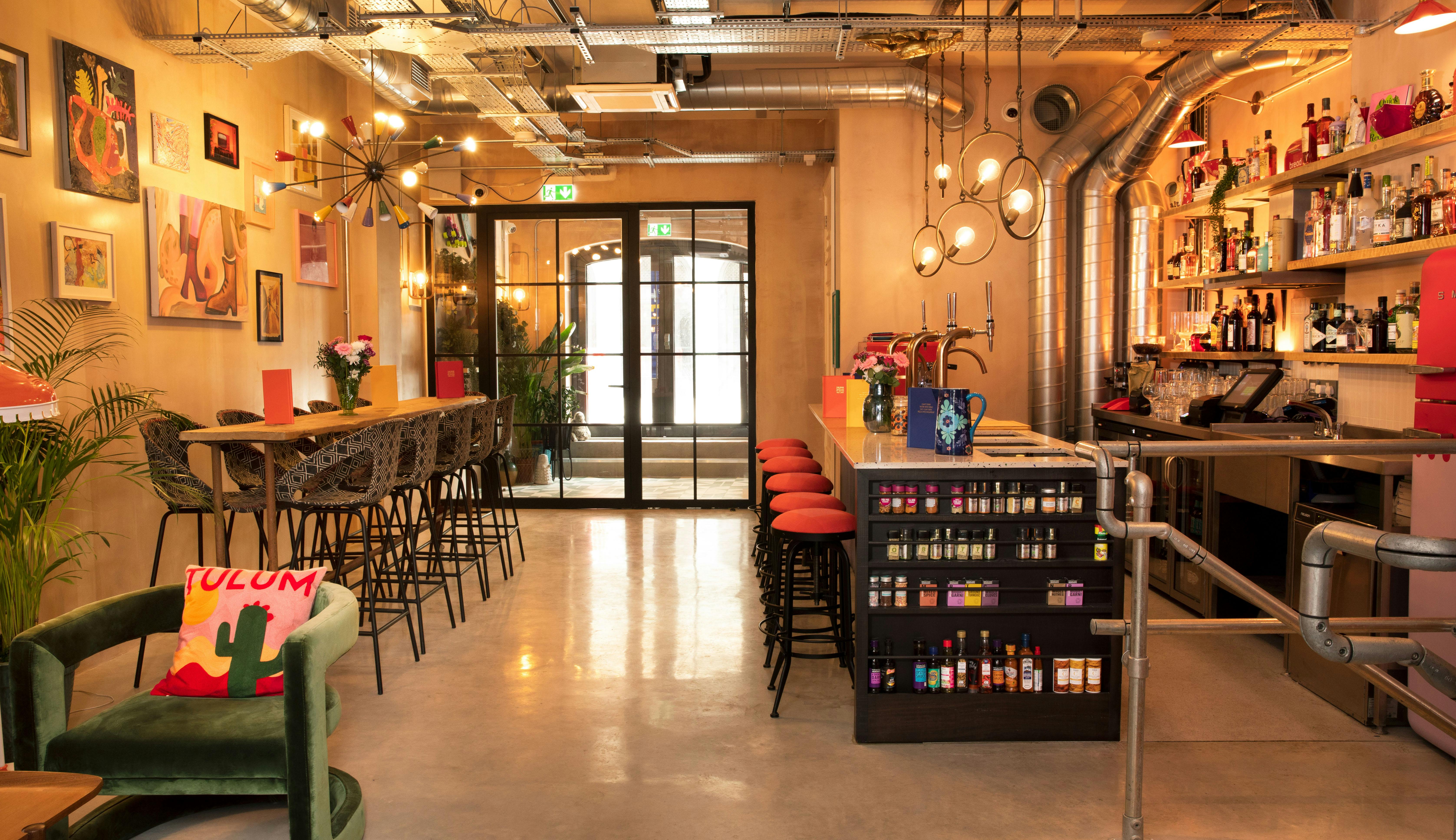 Stylish open plan living room at The Little Scarlet Door for networking events.