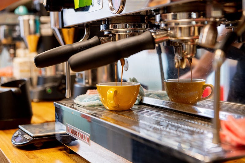 Espresso machine in Well Grounded KX Office for premium coffee service at events.