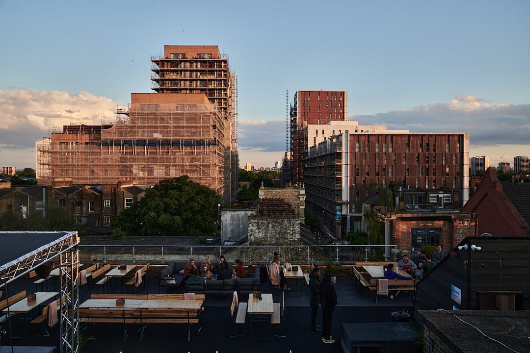 Dalston Roofpark rooftop venue with seating, ideal for networking and social events.